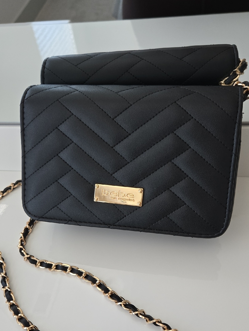 bebe Black Quilted Crossbody with Gold Chain and Plaque